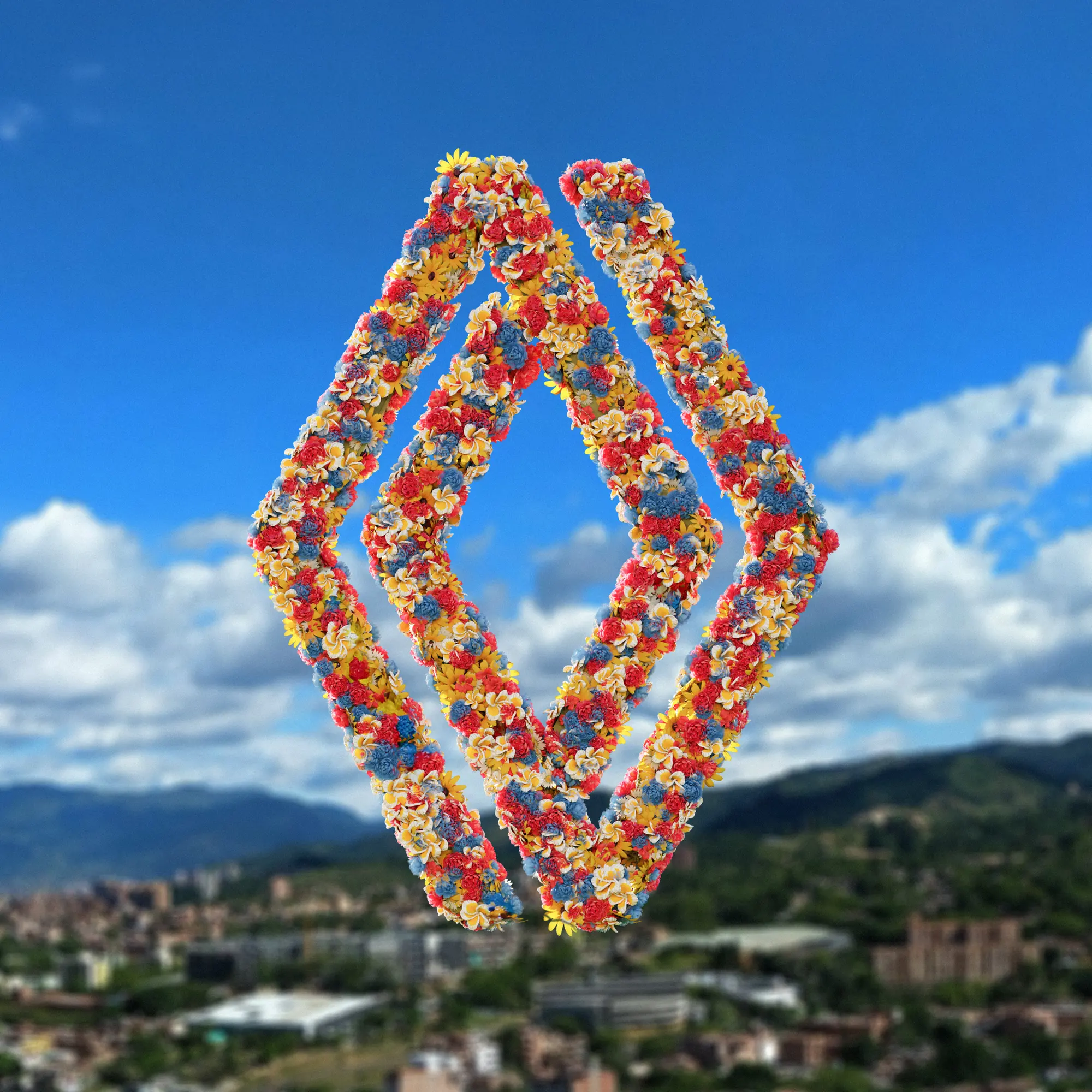 Renault diamond made of flowers under a blue sky